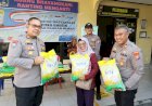 Senyum-Sumringah-Warga-,-Peroleh-Beras-Murah-dari-Polres-Gresik-di-Hari-Pangan-Sedunia